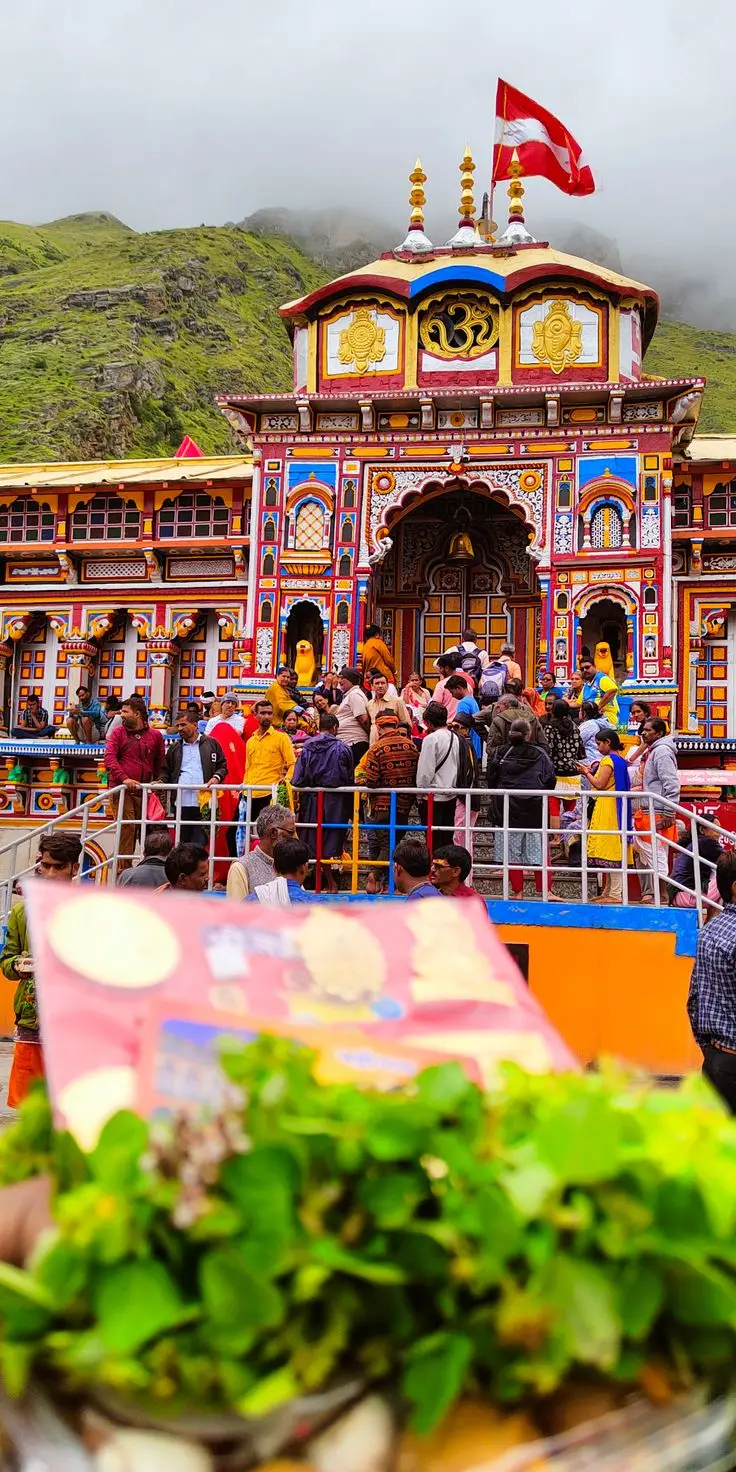 Colorful temple with many visitors.